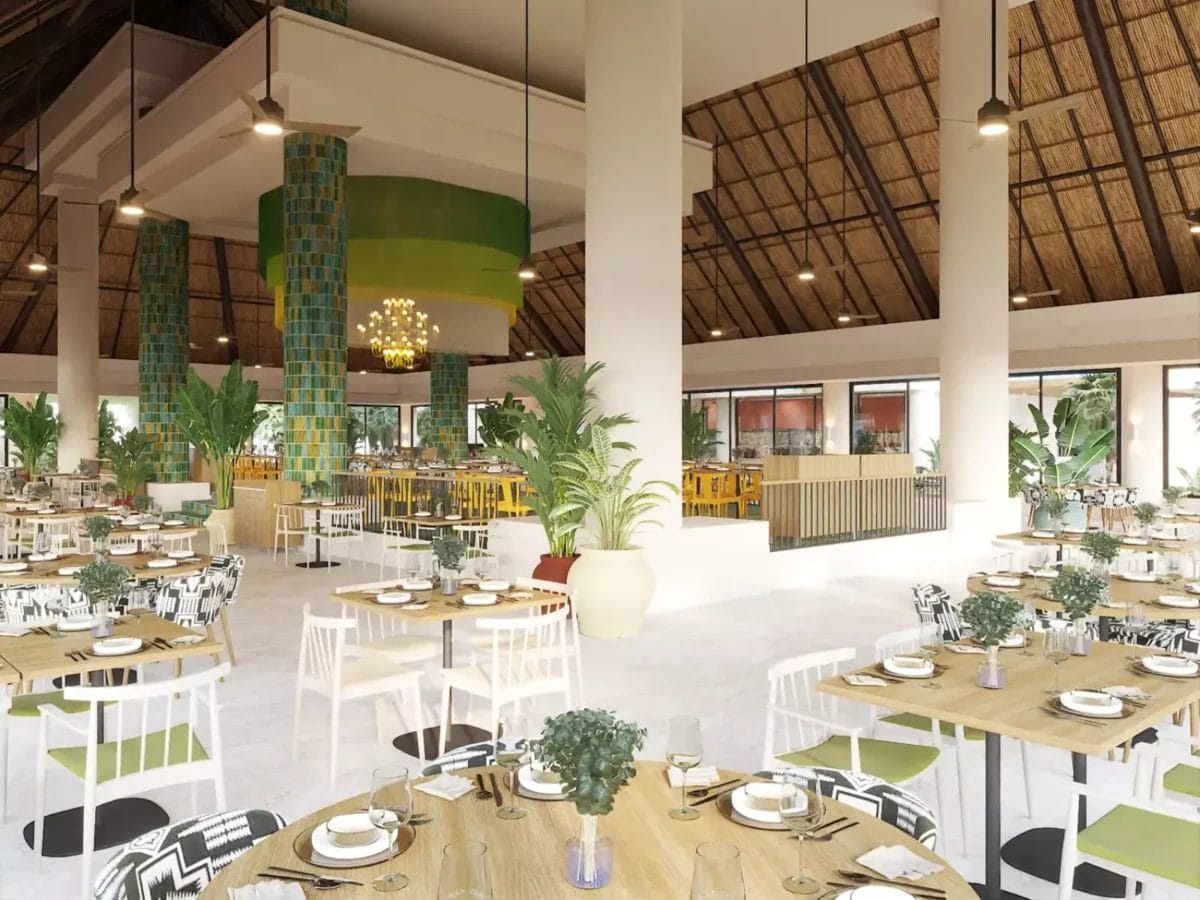 Un rendering del ristorante con tavoli e sedie del Bahia Principe Luxury ad Akumal.